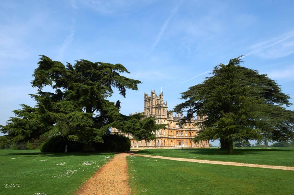 Highclere Castle, is pictured in Highclere, southern England, on May 12, 2016. As Britain mulls questions of identity and its possible exit from the European Union, 2016 is an anniversary year for three of its most potent symbols: the queen, Shakespeare and gardener "Capability" Brown. Lancelot "Capability" Brown is credited with having created over 170 gardens, among them the grounds of Highclere Castle, made famous as the set of the hit television series Downton Abbey. / AFP / NIKLAS HALLE'N / TO GO WITH AFP STORY BY FLORENCE BIEDERMANN (Photo credit should read NIKLAS HALLE'N/AFP/Getty Images)