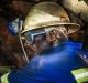 A copper ore miner in Zambia: Antofagasta sees the glut in the red metal lasting for another two years.