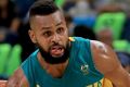 Hot hand: Patty Mills was influential against Lithuania.