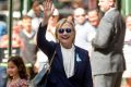 Hillary Clinton waves after leaving her daughter's apartment after her health turn on September 11. Some conspiracy ...