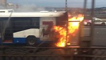 Bus fire closes all lanes on Sydney Harbour Bridge.