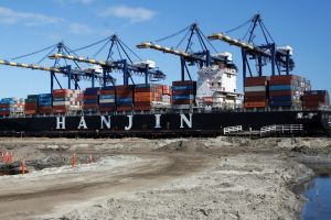 The container ship Hanjin Boston is unloaded at the Port of Los Angeles on Tuesday. 