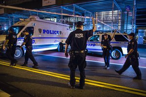 Police arrive on the scene of an explosion in Manhattan's Chelsea neighborhood, in New York, Saturday, Sept. 17, 2016. A law enforcement official tells The Associated Press that an explosion in the Chelsea neighborhood appears to have come from a construction toolbox in front of a building.