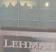 FILE - In this Sept. 15, 2008 file photo, office workers are silhouetted against the widow of the Lehman Brothers ...