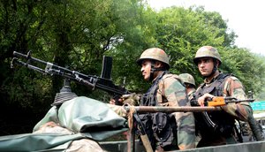 File - Indian Army jawan keep vilgil at Kaman Post  on the Line of Control (LoC) in Uri  North kashmir’s Baramulla district 120 kms from Srinagar, India, 20, August 2015.