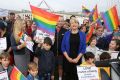 Opposition Leader Bill Shorten joined Greens senator Janet Rice and ''rainbow families'' opposed to a plebiscite on ...