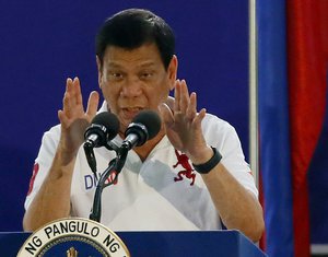 Philippine President Rodrigo Duterte gestures while addressing Philippine Army Scout Rangers during his visit to their headquarters at Camp Tecson in San Miguel township, Bulacan province north of Manila, Philippines Thursday, Sept. 15, 2016.