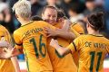 Caitlin Foord, of Australia, celebrates a goal with team mates during the women's international friendly match between ...