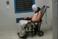 Dylan Voller in a restraining chair in the footage aired on <i>Four Corners</i> on the ABC.