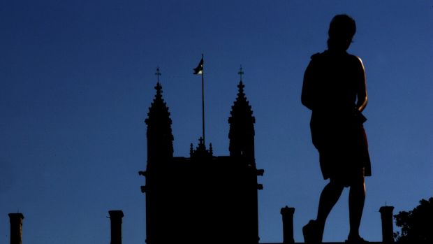 A student outside the famous University of Sydney Quadrangle building.