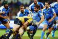 PERTH, AUSTRALIA - MARCH 11: David Pocock of the Brumbies tackles Ben McCalman of the Western Force during the round ...