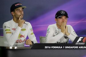 Race winner Nico Rosberg, centre, sits with Daniel Ricciardo, left, and Lewis Hamilton.