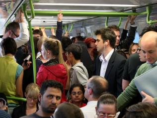 Over-crowded trains on Metro Trains on the Craigieburn line. Passengers. Commuters.