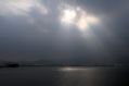 The sun shines from behind the clouds over the Fujairah port during the launch of the new $US650 million oil facility in ...