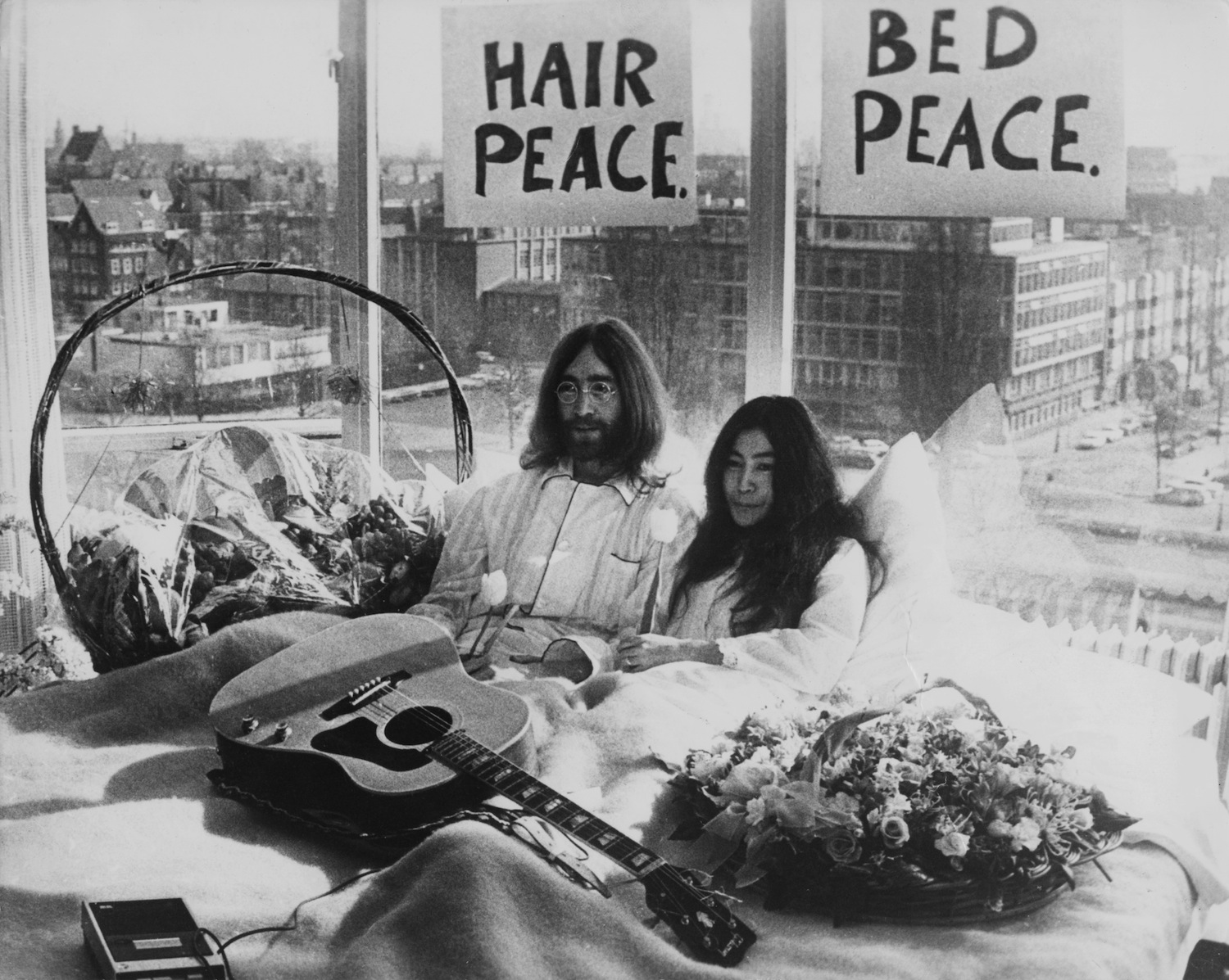 Beatle John Lennon (1940 ? 1980) and his wife of a week Yoko Ono in their bed in the Presidential Suite of the Hilton Hotel, 