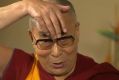 The Dalai Lama and his impression of Donald Trump's hair.