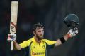 Australia's Glenn Maxwell celebrates scoring a century against Sri Lanka during their first Twenty20 cricket match in ...