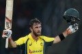 Australia's Glenn Maxwell celebrates scoring a century against Sri Lanka during their first Twenty20 cricket match in ...