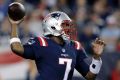 No Brady, no problems: Jacoby Brissett drops back to pass. 