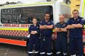 Ambulance officers are using liquid chalk messages to protest against the Baird government.