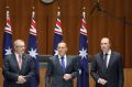 A boom microphone picks up the private conversation of Scott Morrison, Tony Abbott and Peter Dutton  in September last ...