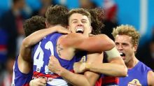 Jack Macrae embraces teammates in round 15.