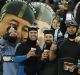 Twisted sense of humour: Sharks supporters dressed as Harold Holt are seen in the crowd. The supporters were dressed as ...