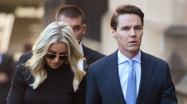 Stockbroker Oliver Curtis (right) arrives with his wife Roxy Jacenko at the Supreme Court in Sydney, Wednesday, May 11, 2016. Curtis is facing insider trading charges. (AAP Image/Dean Lewins) NO ARCHIVING EMBARGOED FOR GOOD WEEKEND, OCT 1/16 ISSUE. Curtis & Hartman story. (supplied image, no archiving)