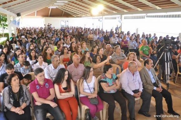 Syriac Catholic refugees from Syria and Iraq attending a gathering in Lebanon. 05/05/2013