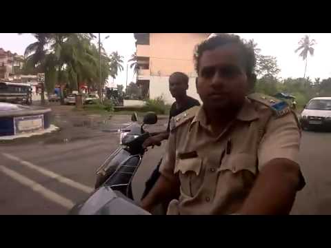 Indian Police Caught without helmet - Cops breaking law