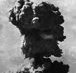 File - Thick black smoke plumes skywards after Britain's first nuclear bomb test in a series at the Maralinga testing ground in South Australia, Sept. 14, 1957.