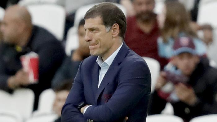 West Ham manager Slaven Bilic stands with his arms folded after Southampton scored their third goal during the English Premier League soccer match between West Ham and Southampton at The London Stadium in London, Sunday, Sept. 25, 2016. (AP Photo/Matt Dunham)