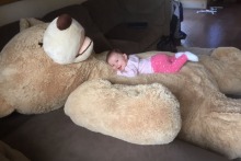 Baby Madeline is a fan of her big new friend.