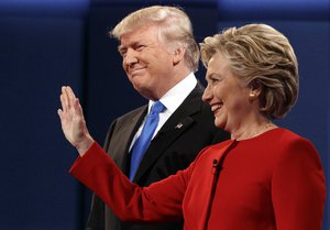 Republican presidential candidate Donald Trump, left, stands with Democratic presidential candidate Hillary Clinton during the first presidential debate at Hofstra University, Monday, Sept. 26, 2016, in Hempstead, N.Y.