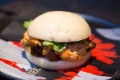 Crisp-fried chicken bao with house-made hot sauce, yellow cheese, kimchi and coriander.