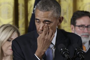 President Barack Obama, wipes a tear from his eye as he speaks in the East Room of the White House in Washington, Tuesday, Jan. 5, 2016, about steps his administration is taking to reduce gun violence.