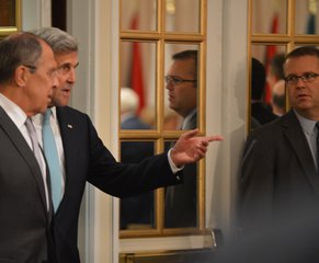 Secretary Kerry Chats With Russian Foreign Minister Lavrov Prior to the International Syria Support Group Meeting