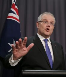 Treasurer Scott Morrison and Minister for Revenue and Financial Services Kelly O'Dwyer address the media during a press ...