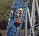 Several roller-coaster riders are helped out of the ride at Sea World.