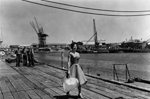 Actress Ava Gardner as Moira Davidson walks along a wharf in the Port of Melbourne in 1959.