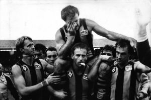 1985 Grand Final - Leigh Matthews sheds a tear at the end of his last game, as he is carried off the ground by team ...