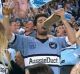 Shoe-in of the week: A Cronulla fan does a 'shoey' after Chad Townsend's first half try.