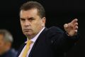 MELBOURNE, AUSTRALIA - JUNE 07: Socceroos head coach Ange Postecoglou getsures to players uring the International ...