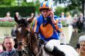 Jockey Ryan Moore celebrates after guiding Order of St George to victory in the Gold Cup at Royal Ascot in June.