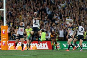 One perfect moment: The Cowboys celebrate winning the 2015 NRL grand final. 