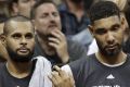 In harmony: San Antonio Spurs won five championships during Tim Duncan's career, including teaming up with Patty Mills ...