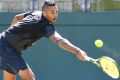 Limbering up: Nick Kyrgios practises on Monday ahead of Australia's David Cup play-off against Slovakia. 
