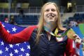 Lilly King celebrates, as Yulia Efimova looks on in Rio.