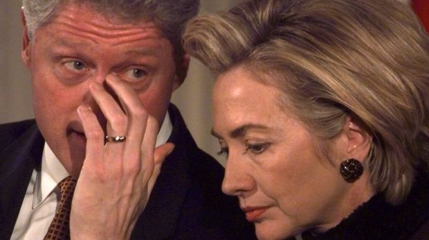 President Clinton talks with first lady Hillary Rodham Clinton at the White House in 1999.