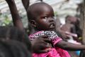 A baby in the queue for food at a camp for displaced people near the United Nations base in Juba, South Sudan. 